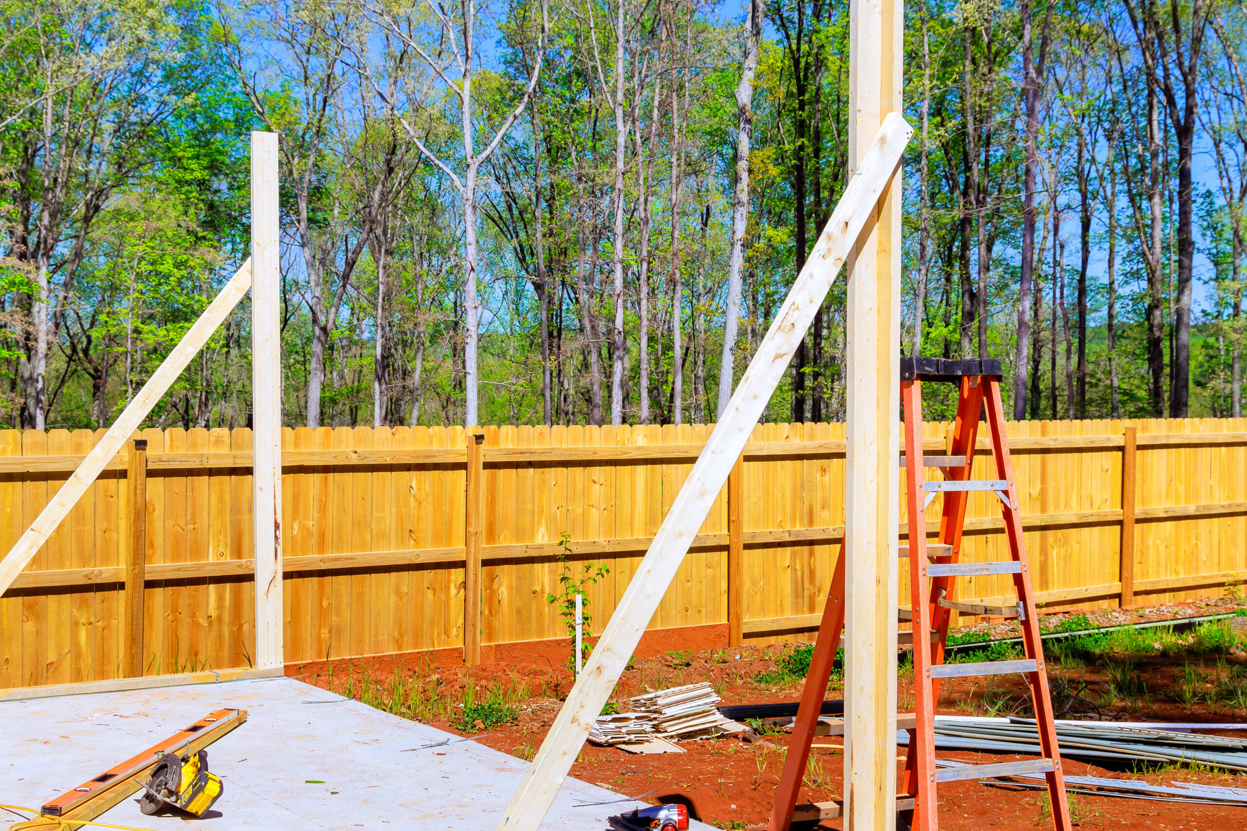 fencing, work in progress view of new unfinished house with utc scaled